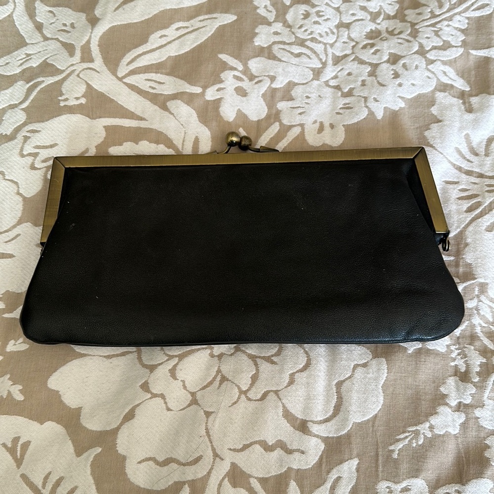 Black leather clutch with chain strap